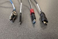 Pedestal - laptop cable connections with cables pulled out showing cable ends