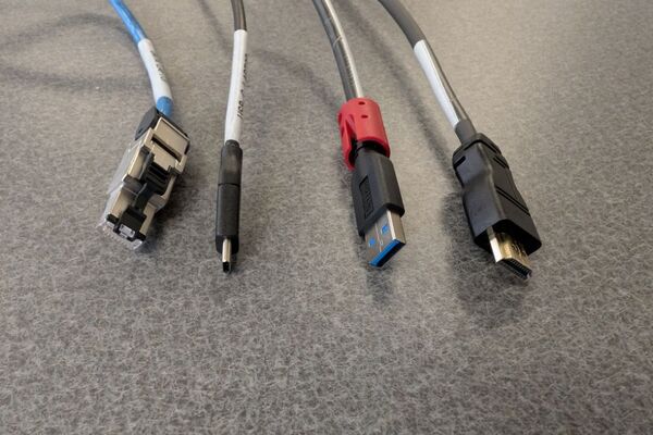 Pedestal - laptop cable connections with cables pulled out showing cable ends