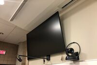 Monitor mounted so that students will be able to see remote participants without having to turn to look at the projection screen