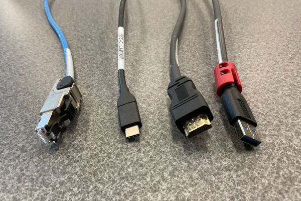 Pedestal - laptop cable connections with cables pulled out showing cable ends