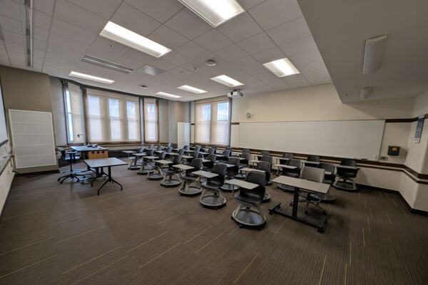 Back of room view of student tablet arm seating 