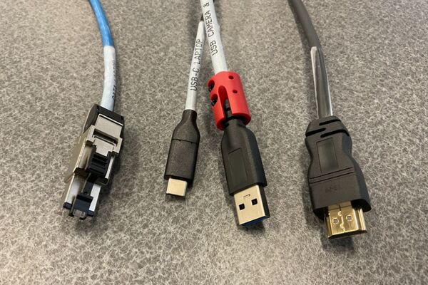 Pedestal - laptop cable connections with cables pulled out showing cable ends