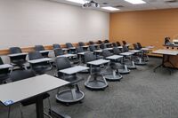 Back of room view of student tablet arm seating 