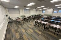 Back of room view of student table and chair seating