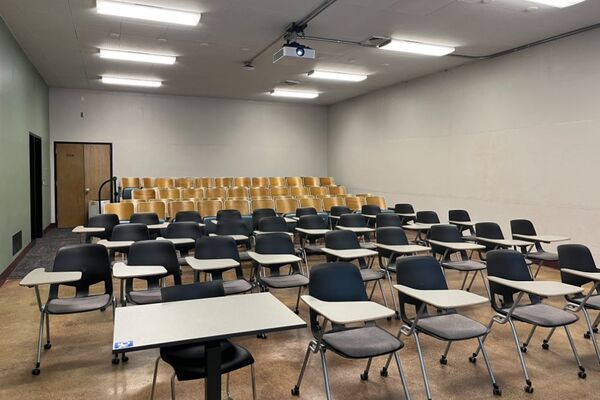 Back of room view of student auditorium and tablet arm seating 