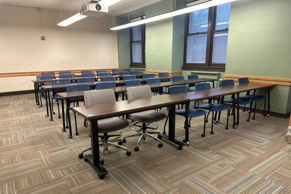 Back of room view of tables and chairs