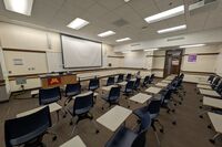 Front of Room View with Instructor Pedestal to Left of Board