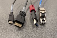 Pedestal - laptop cable connections with cables pulled out showing cable ends