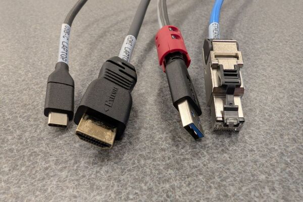 Pedestal - laptop cable connections with cables pulled out showing cable ends