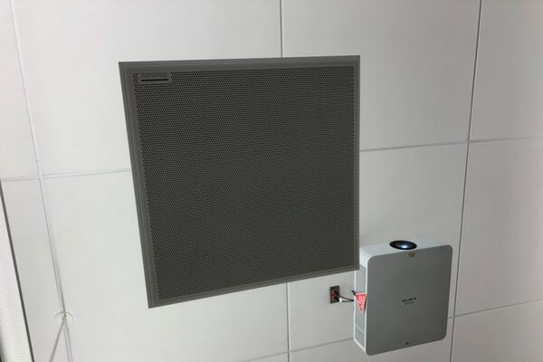 A 2’ x 2’ tile mounted to the ceiling to provide microphone coverage over student seating