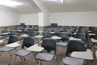 Back of room view of student tablet arm seating 