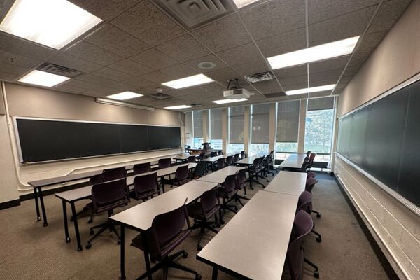  Front of room view with lectern on right in front of chalkboard