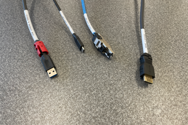 Pedestal - laptop cable connections with cables pulled out showing cable ends