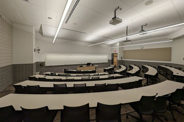 Front of room view with lectern center in front of markerboard 