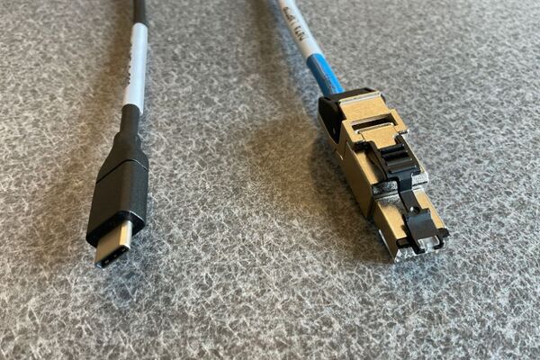 Pedestal - laptop cable connections with cables pulled out showing cable ends