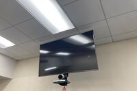 Monitor mounted in back of room so that the instructor will be able to see the presentation being displayed without having to turn to look at the projection screen.
