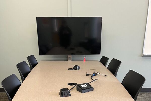 Group seating with connections for student provided laptops, monitor at table