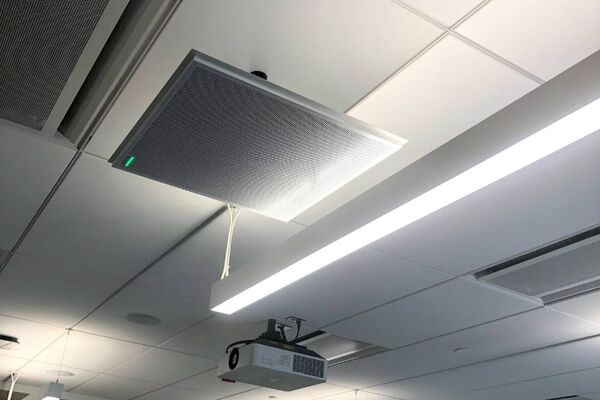 A 2¿ x 2¿ tile mounted to the ceiling to provide microphone coverage over student seating