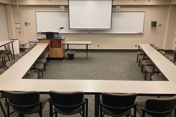 Room view with lectern and faculty table on left