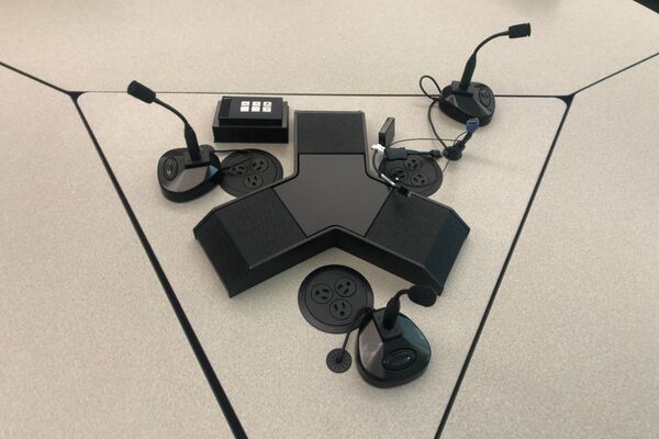 Group seating with connections for student provided laptops and push-to-talk microphone